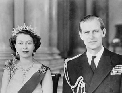 Queen Elizabeth Ii And Husband Duke Of Edinburgh Posing In Royal Attire